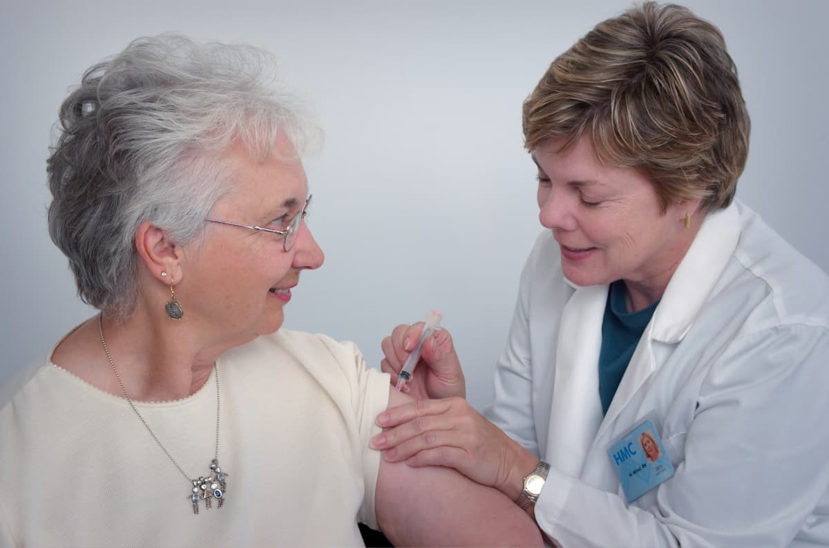 Caregiver supporting a resident in senior living
